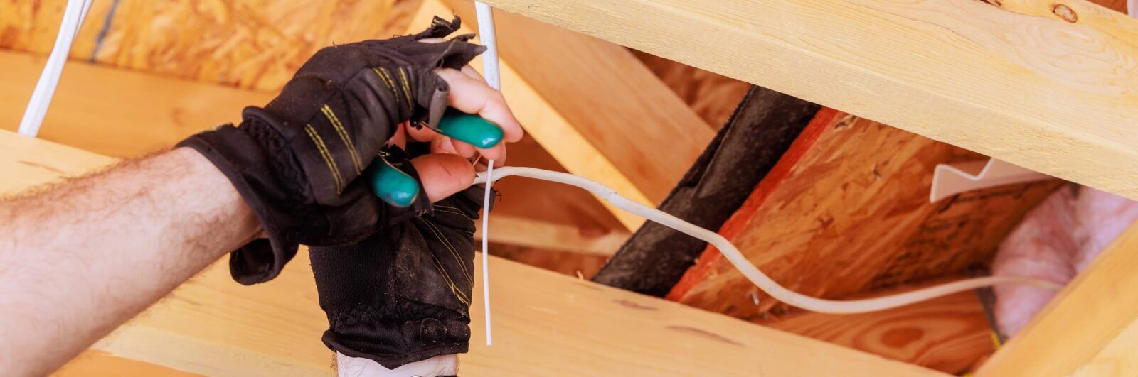 Electrician wiring a new home