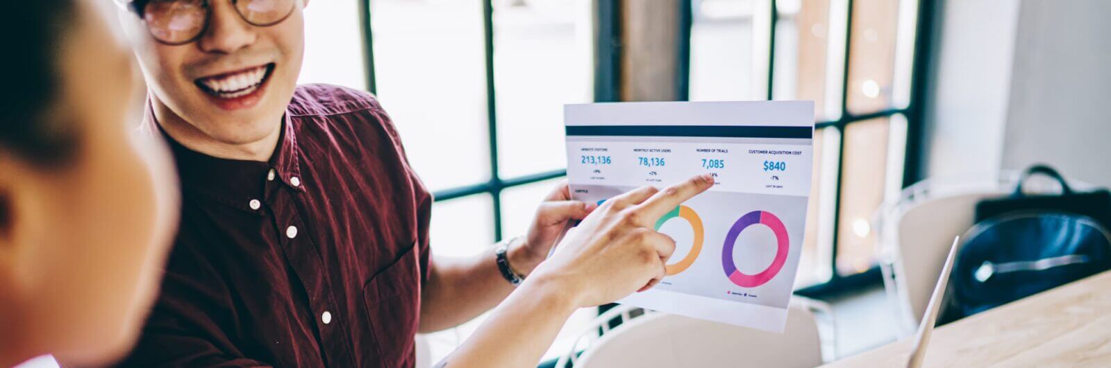 Young marketing team reviewing analytics data