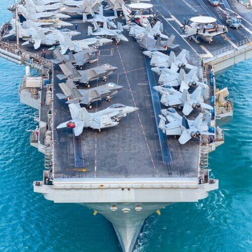 Military aircraft carrier at sea