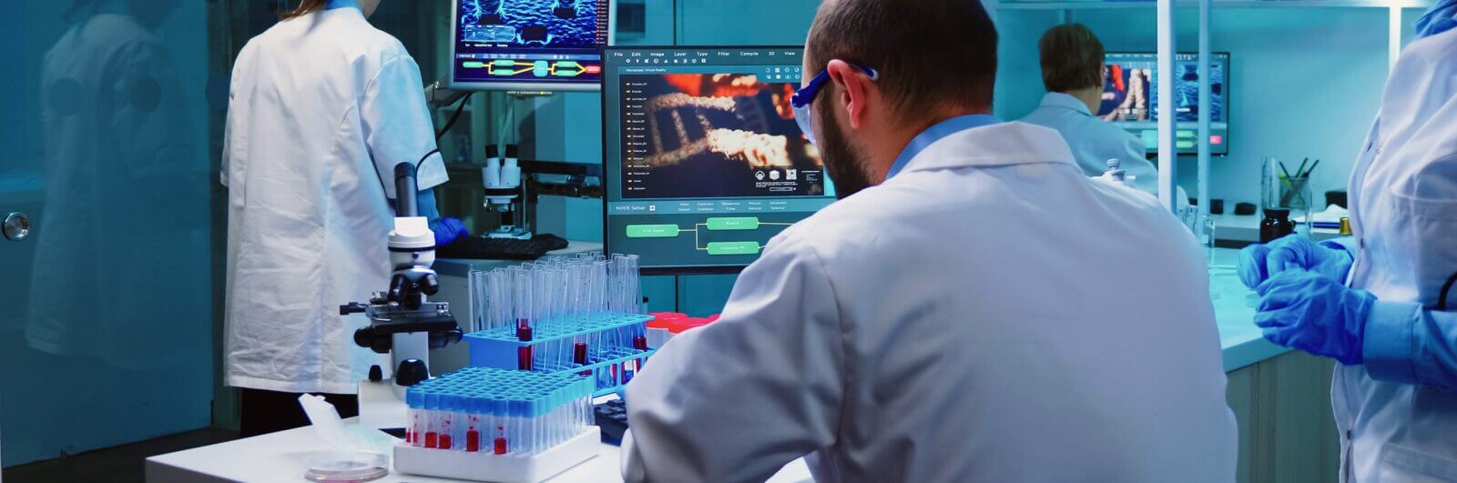 Scientists at work in a pathology lab