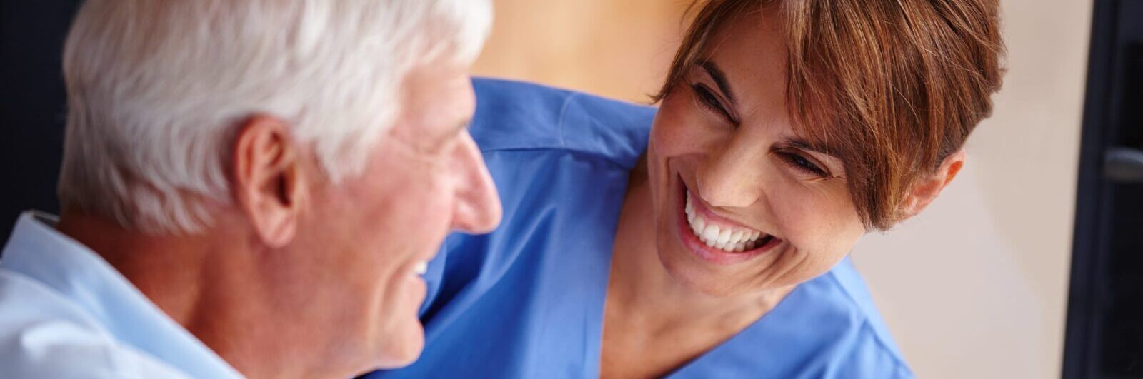 Young nurse and an older patient